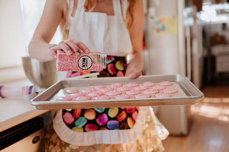 Brand details for baker adding sprinkles to her product during her branding session