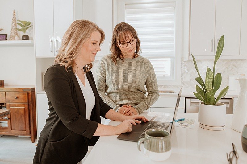 Brand visual of small business owners at a computer