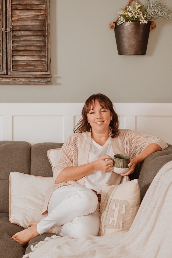 Personal branding photographer working with client in warm, natural light