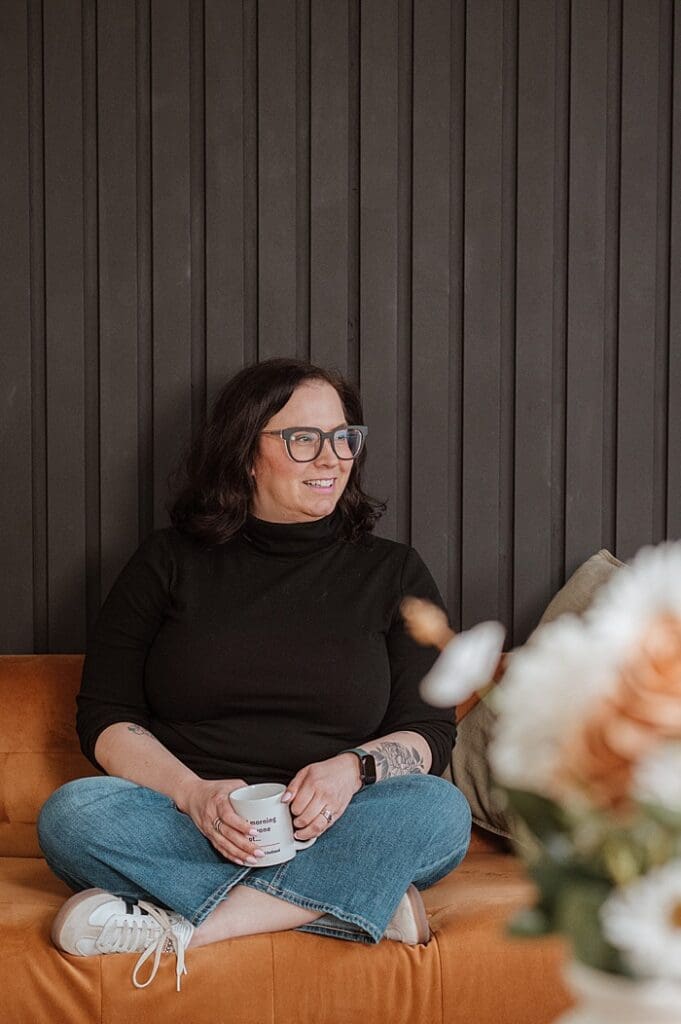 Entrepreneur wearing neutral-toned outfit during personal brand photo shoot