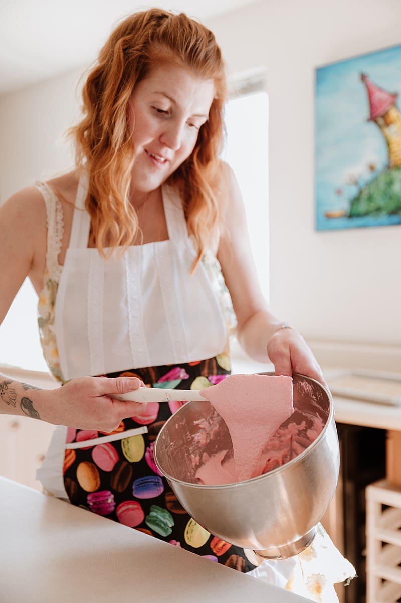 Creative entrepreneur working with hands on product during shoo