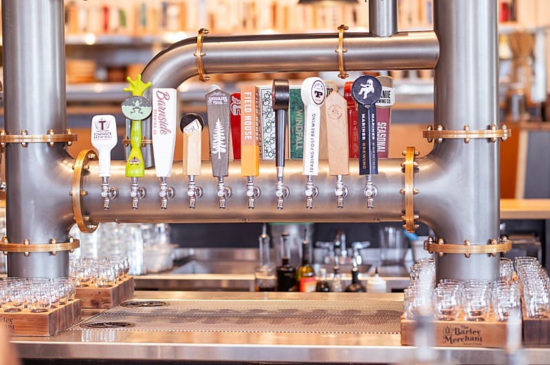 Long row of colourful taps at a local Langley Retaurant